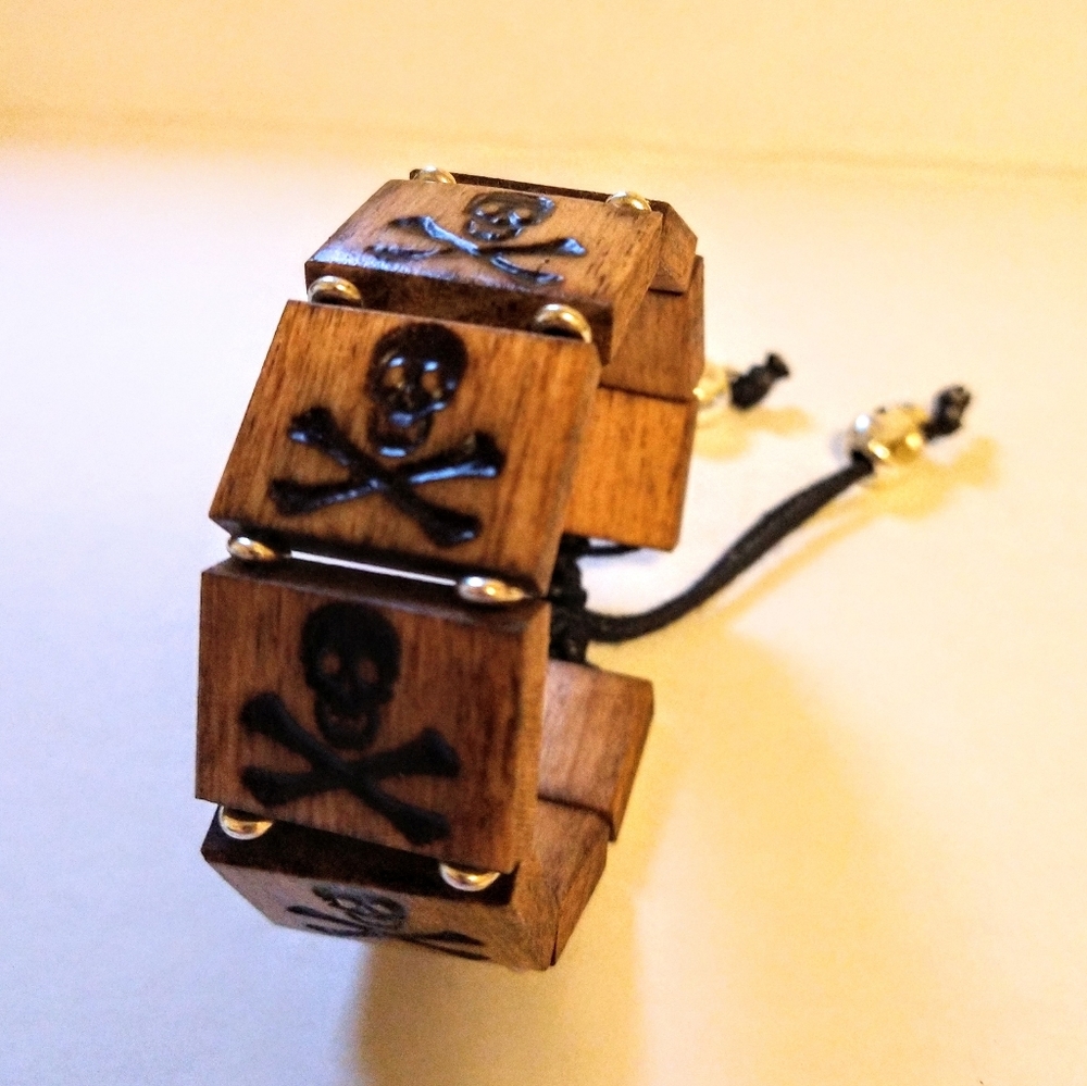 Skull and Crossbones engraved tile slip cord brace